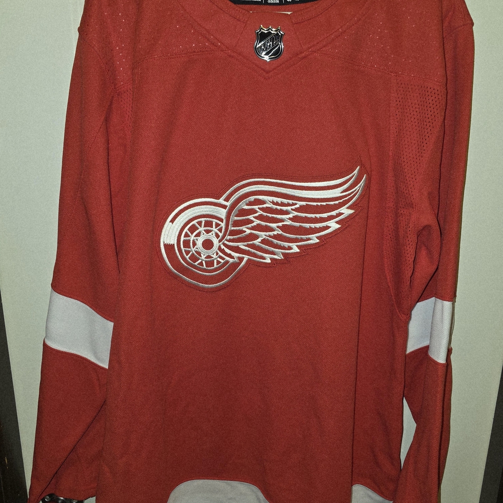 Red Hockey Jersey with Winged Wheel Logo